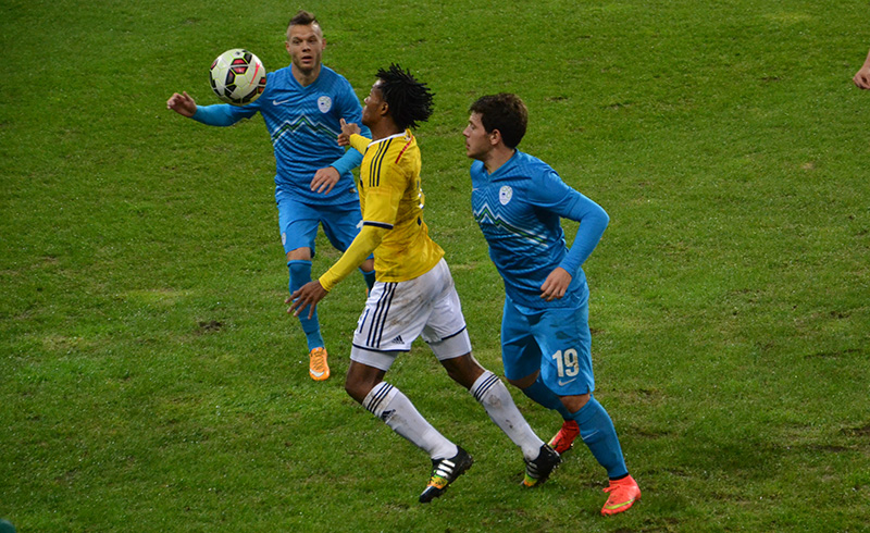 Erik Janža in Juan Cuadrado
